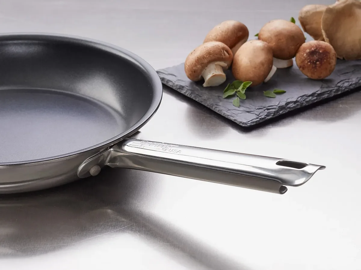 Spring USA 8478-60/20A Vulcano Fry Pan, 1/2 qt, 7.9" Dia x 1.5" H, stainless/al, stick, riveted handle, induction, 500°F