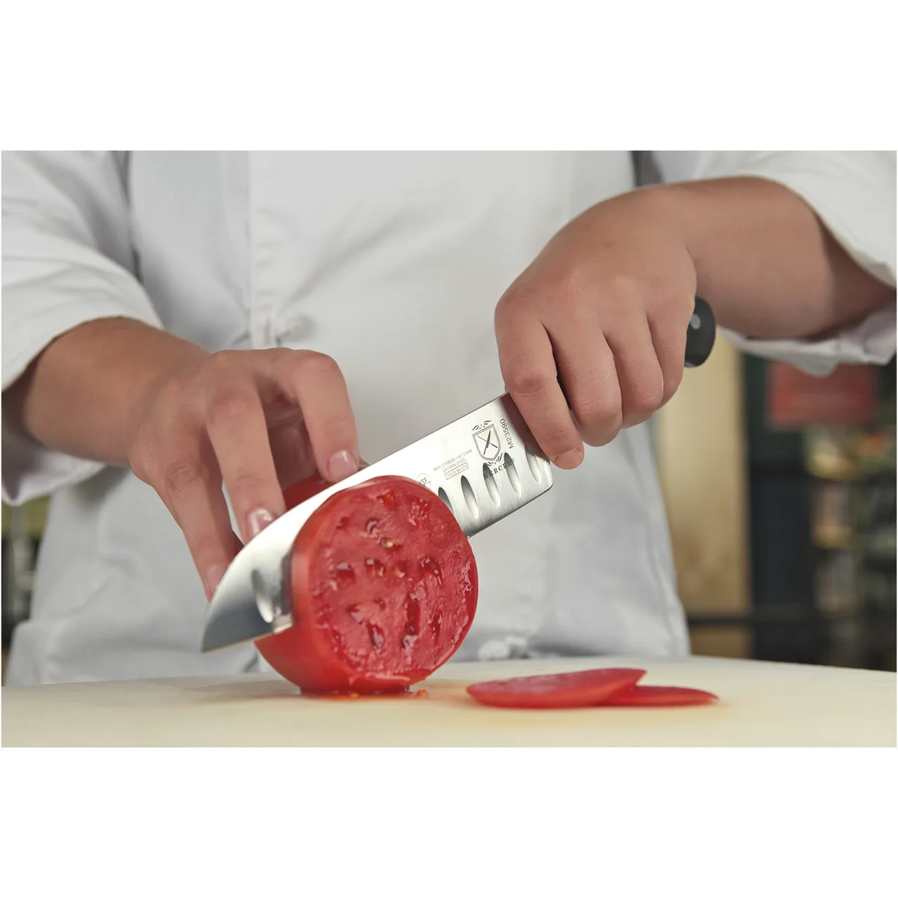 Mercer M23590 Santoku Knife, 7" Granton Edge, Carbon Steel Blade, Triple‑Riveted Delrin Handle, NSF