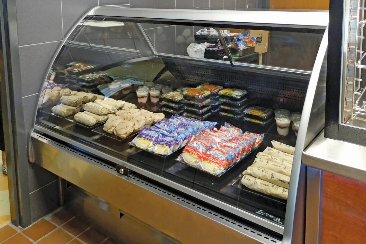 Structural Concepts GLDS6R 75" Curved Refrigerated Deli Display Case